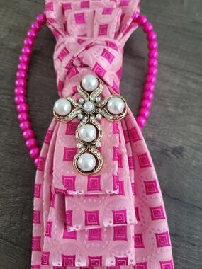 Pearl and Rhinestone Cross Brooch on Pink Patterned Necktie